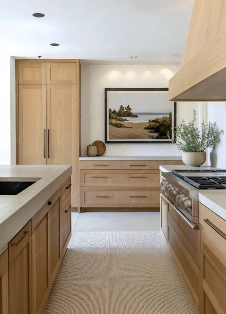 White oak shaker kitchen with integrated panel cabinetry, wood range hood and stone countertops
